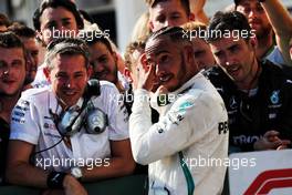 Race winner Lewis Hamilton (GBR) Mercedes AMG F1 with the team in parc ferme. 29.07.2018. Formula 1 World Championship, Rd 12, Hungarian Grand Prix, Budapest, Hungary, Race Day.