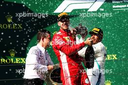 Sebastian Vettel (GER) Ferrari celebrates his second position on the podium with the champagne. 29.07.2018. Formula 1 World Championship, Rd 12, Hungarian Grand Prix, Budapest, Hungary, Race Day.