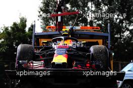 The Red Bull Racing RB14 of race retiree Max Verstappen (NLD) is recovered back to the pits on the back of a truck. 29.07.2018. Formula 1 World Championship, Rd 12, Hungarian Grand Prix, Budapest, Hungary, Race Day.