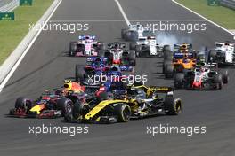 Carlos Sainz Jr (ESP) Renault F1 Team and Max Verstappen (NLD) Red Bull Racing  29.07.2018. Formula 1 World Championship, Rd 12, Hungarian Grand Prix, Budapest, Hungary, Race Day.
