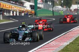 Valtteri Bottas (FIN) Mercedes AMG F1 and Sebastian Vettel (GER) Scuderia Ferrari  29.07.2018. Formula 1 World Championship, Rd 12, Hungarian Grand Prix, Budapest, Hungary, Race Day.