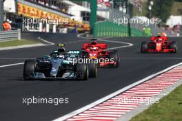 Valtteri Bottas (FIN) Mercedes AMG F1 and Sebastian Vettel (GER) Scuderia Ferrari  29.07.2018. Formula 1 World Championship, Rd 12, Hungarian Grand Prix, Budapest, Hungary, Race Day.