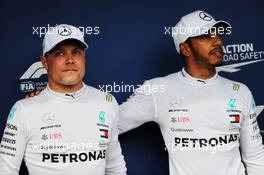 (L to R): Second placed Valtteri Bottas (FIN) Mercedes AMG F1 in qualifying parc ferme with team mate and pole sitter Lewis Hamilton (GBR) Mercedes AMG F1. 28.07.2018. Formula 1 World Championship, Rd 12, Hungarian Grand Prix, Budapest, Hungary, Qualifying Day.