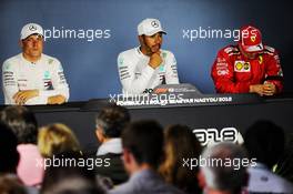 The post qualifying FIA Press Conference (L to R): Valtteri Bottas (FIN) Mercedes AMG F1, second; Lewis Hamilton (GBR) Mercedes AMG F1, pole position; Kimi Raikkonen (FIN) Ferrari, third. 28.07.2018. Formula 1 World Championship, Rd 12, Hungarian Grand Prix, Budapest, Hungary, Qualifying Day.