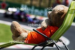 Pierre Gasly (FRA) Scuderia Toro Rosso STR13 watched by a teddy bear on a deck chair. 28.07.2018. Formula 1 World Championship, Rd 12, Hungarian Grand Prix, Budapest, Hungary, Qualifying Day.