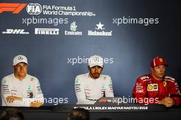 The post qualifying FIA Press Conference (L to R): Valtteri Bottas (FIN) Mercedes AMG F1, second; Lewis Hamilton (GBR) Mercedes AMG F1, pole position; Kimi Raikkonen (FIN) Ferrari, third. 28.07.2018. Formula 1 World Championship, Rd 12, Hungarian Grand Prix, Budapest, Hungary, Qualifying Day.