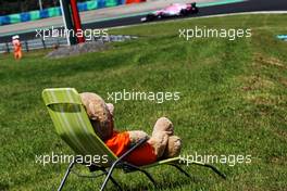 Esteban Ocon (FRA) Sahara Force India F1 VJM11 watched by a teddy bear on a deck chair. 28.07.2018. Formula 1 World Championship, Rd 12, Hungarian Grand Prix, Budapest, Hungary, Qualifying Day.