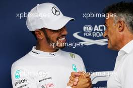 Lewis Hamilton (GBR) Mercedes AMG F1 celebrates his pole position in qualifying parc ferme with Jean Alesi (FRA). 28.07.2018. Formula 1 World Championship, Rd 12, Hungarian Grand Prix, Budapest, Hungary, Qualifying Day.