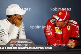 (L to R): Lewis Hamilton (GBR) Mercedes AMG F1 and Kimi Raikkonen (FIN) Ferrari in the post qualifying FIA Press Conference. 28.07.2018. Formula 1 World Championship, Rd 12, Hungarian Grand Prix, Budapest, Hungary, Qualifying Day.