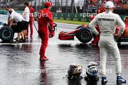 Kimi Raikkonen (FIN) Ferrari and Valtteri Bottas (FIN) Mercedes AMG F1 in qualifying parc ferme. 28.07.2018. Formula 1 World Championship, Rd 12, Hungarian Grand Prix, Budapest, Hungary, Qualifying Day.