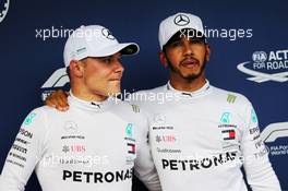 (L to R): Valtteri Bottas (FIN) Mercedes AMG F1 with team mate and pole sitter Lewis Hamilton (GBR) Mercedes AMG F1 in qualifying parc ferme. 28.07.2018. Formula 1 World Championship, Rd 12, Hungarian Grand Prix, Budapest, Hungary, Qualifying Day.