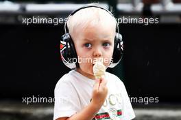 Robin Raikkonen (FIN), son of Kimi Raikkonen (FIN) Ferrari, enjoying an ice cream in qualifying parc ferme. 28.07.2018. Formula 1 World Championship, Rd 12, Hungarian Grand Prix, Budapest, Hungary, Qualifying Day.