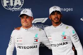 (L to R): Valtteri Bottas (FIN) Mercedes AMG F1 with team mate and pole sitter Lewis Hamilton (GBR) Mercedes AMG F1 in qualifying parc ferme. 28.07.2018. Formula 1 World Championship, Rd 12, Hungarian Grand Prix, Budapest, Hungary, Qualifying Day.