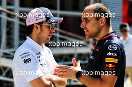 (L to R): Sergio Perez (MEX) Sahara Force India F1 talks with Gianpiero Lambiase (ITA) Red Bull Racing Engineer. 29.07.2018. Formula 1 World Championship, Rd 12, Hungarian Grand Prix, Budapest, Hungary, Race Day.