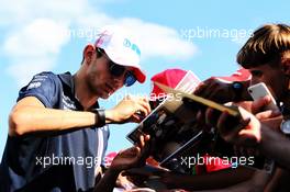 Esteban Ocon (FRA) Sahara Force India F1 Team signs autographs for the fans. 26.07.2018. Formula 1 World Championship, Rd 12, Hungarian Grand Prix, Budapest, Hungary, Preparation Day.