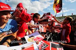 Sebastian Vettel (GER) Ferrari signs autographs for the fans. 26.07.2018. Formula 1 World Championship, Rd 12, Hungarian Grand Prix, Budapest, Hungary, Preparation Day.