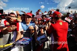Kimi Raikkonen (FIN) Ferrari signs autographs for the fans. 26.07.2018. Formula 1 World Championship, Rd 12, Hungarian Grand Prix, Budapest, Hungary, Preparation Day.