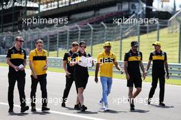 Carlos Sainz Jr (ESP) Renault Sport F1 Team walks the circuit with the team. 26.07.2018. Formula 1 World Championship, Rd 12, Hungarian Grand Prix, Budapest, Hungary, Preparation Day.