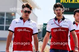 Charles Leclerc (MON) Sauber F1 Team and Antonio Giovinazzi (ITA) Sauber F1 Team Test Driver walk the circuit with the team. 26.07.2018. Formula 1 World Championship, Rd 12, Hungarian Grand Prix, Budapest, Hungary, Preparation Day.