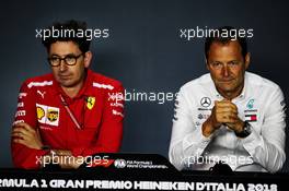 (L to R): Mattia Binotto (ITA) Ferrari Chief Technical Officer and Aldo Costa (ITA) Mercedes AMG F1 Engineering Director in the FIA Press Conference. 31.08.2018. Formula 1 World Championship, Rd 14, Italian Grand Prix, Monza, Italy, Practice Day.