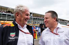 (L to R): Dr Helmut Marko (AUT) Red Bull Motorsport Consultant with Zak Brown (USA) McLaren Executive Director on the grid. 02.09.2018. Formula 1 World Championship, Rd 14, Italian Grand Prix, Monza, Italy, Race Day.