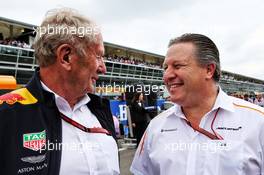 (L to R): Dr Helmut Marko (AUT) Red Bull Motorsport Consultant with Zak Brown (USA) McLaren Executive Director on the grid. 02.09.2018. Formula 1 World Championship, Rd 14, Italian Grand Prix, Monza, Italy, Race Day.