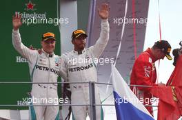 1st place Lewis Hamilton (GBR) Mercedes AMG F1 W09, 2nd Kimi Raikkonen (FIN) Ferrari SF71H and 3rd place Valtteri Bottas (FIN) Mercedes AMG F1. 02.09.2018. Formula 1 World Championship, Rd 14, Italian Grand Prix, Monza, Italy, Race Day.