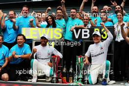 Race winner Lewis Hamilton (GBR) Mercedes AMG F1 celebrates with third placed Valtteri Bottas (FIN) Mercedes AMG F1 and the team. 02.09.2018. Formula 1 World Championship, Rd 14, Italian Grand Prix, Monza, Italy, Race Day.