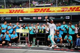 Race winner Lewis Hamilton (GBR) Mercedes AMG F1 celebrates with the team. 02.09.2018. Formula 1 World Championship, Rd 14, Italian Grand Prix, Monza, Italy, Race Day.