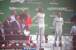 1st place Lewis Hamilton (GBR) Mercedes AMG F1 W09, 2nd Kimi Raikkonen (FIN) Ferrari SF71H and 3rd place Valtteri Bottas (FIN) Mercedes AMG F1. 02.09.2018. Formula 1 World Championship, Rd 14, Italian Grand Prix, Monza, Italy, Race Day.