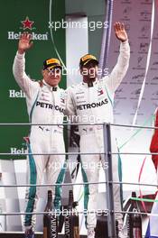 The podium (L to R): third placed Valtteri Bottas (FIN) Mercedes AMG F1 celebrates with race winner and team mate Lewis Hamilton (GBR) Mercedes AMG F1. 02.09.2018. Formula 1 World Championship, Rd 14, Italian Grand Prix, Monza, Italy, Race Day.