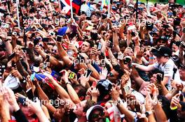 Lewis Hamilton (GBR) Mercedes AMG F1 fans celebrate. 02.09.2018. Formula 1 World Championship, Rd 14, Italian Grand Prix, Monza, Italy, Race Day.