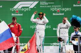 The podium (L to R): Kimi Raikkonen (FIN) Ferrari, second; Lewis Hamilton (GBR) Mercedes AMG F1, race winner; Valtteri Bottas (FIN) Mercedes AMG F1, third. 02.09.2018. Formula 1 World Championship, Rd 14, Italian Grand Prix, Monza, Italy, Race Day.