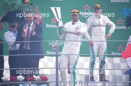 1st place Lewis Hamilton (GBR) Mercedes AMG F1 W09, 2nd Kimi Raikkonen (FIN) Ferrari SF71H and 3rd place Valtteri Bottas (FIN) Mercedes AMG F1. 02.09.2018. Formula 1 World Championship, Rd 14, Italian Grand Prix, Monza, Italy, Race Day.