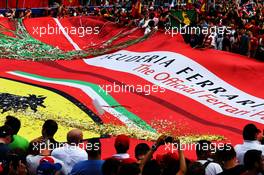 Ferrari fans and a large flag at the podium. 02.09.2018. Formula 1 World Championship, Rd 14, Italian Grand Prix, Monza, Italy, Race Day.