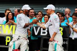 Race winner Lewis Hamilton (GBR) Mercedes AMG F1 celebrates with third placed Valtteri Bottas (FIN) Mercedes AMG F1 and the team. 02.09.2018. Formula 1 World Championship, Rd 14, Italian Grand Prix, Monza, Italy, Race Day.