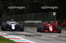 Sergey Sirotkin (RUS) Williams FW41 and Sebastian Vettel (GER) Ferrari SF71H battle for position. 02.09.2018. Formula 1 World Championship, Rd 14, Italian Grand Prix, Monza, Italy, Race Day.