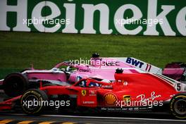Sebastian Vettel (GER) Ferrari SF71H and Sergio Perez (MEX) Racing Point Force India F1 VJM11 battle for position. 02.09.2018. Formula 1 World Championship, Rd 14, Italian Grand Prix, Monza, Italy, Race Day.