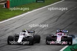 Sergey Sirotkin (RUS) Williams FW41 and Sergio Perez (MEX) Racing Point Force India F1 VJM11 battle for position. 02.09.2018. Formula 1 World Championship, Rd 14, Italian Grand Prix, Monza, Italy, Race Day.