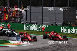 Kimi Raikkonen (FIN) Ferrari SF71H and Sebastian Vettel (GER) Ferrari SF71H at the start of the race. 02.09.2018. Formula 1 World Championship, Rd 14, Italian Grand Prix, Monza, Italy, Race Day.