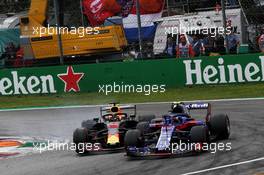Daniel Ricciardo (AUS) Red Bull Racing RB14 and Pierre Gasly (FRA) Scuderia Toro Rosso STR13 battle for position. 02.09.2018. Formula 1 World Championship, Rd 14, Italian Grand Prix, Monza, Italy, Race Day.