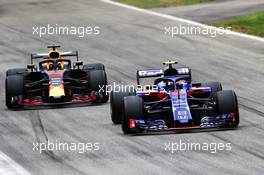 Pierre Gasly (FRA) Scuderia Toro Rosso STR13 and Daniel Ricciardo (AUS) Red Bull Racing RB14. 02.09.2018. Formula 1 World Championship, Rd 14, Italian Grand Prix, Monza, Italy, Race Day.