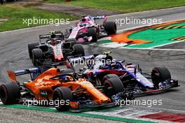 Fernando Alonso (ESP) McLaren MCL33 and Pierre Gasly (FRA) Scuderia Toro Rosso STR13. 02.09.2018. Formula 1 World Championship, Rd 14, Italian Grand Prix, Monza, Italy, Race Day.