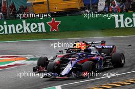 Daniel Ricciardo (AUS) Red Bull Racing RB14 and Pierre Gasly (FRA) Scuderia Toro Rosso STR13 battle for position. 02.09.2018. Formula 1 World Championship, Rd 14, Italian Grand Prix, Monza, Italy, Race Day.