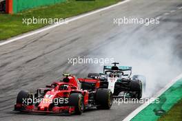 Kimi Raikkonen (FIN) Ferrari SF71H leads Lewis Hamilton (GBR) Mercedes AMG F1 W09. 02.09.2018. Formula 1 World Championship, Rd 14, Italian Grand Prix, Monza, Italy, Race Day.