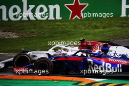 Charles Leclerc (MON) Sauber F1 Team C37 and Pierre Gasly (FRA) Scuderia Toro Rosso STR13 battle for position. 02.09.2018. Formula 1 World Championship, Rd 14, Italian Grand Prix, Monza, Italy, Race Day.