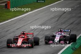Sebastian Vettel (GER) Ferrari SF71H and Sergio Perez (MEX) Racing Point Force India F1 VJM11 battle for position. 02.09.2018. Formula 1 World Championship, Rd 14, Italian Grand Prix, Monza, Italy, Race Day.