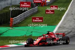 Sebastian Vettel (GER) Ferrari SF71H with a broken front wing at the start of the race. 02.09.2018. Formula 1 World Championship, Rd 14, Italian Grand Prix, Monza, Italy, Race Day.