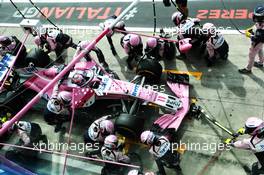 Sergio Perez (MEX) Racing Point Force India F1 VJM11 makes a pit stop. 02.09.2018. Formula 1 World Championship, Rd 14, Italian Grand Prix, Monza, Italy, Race Day.