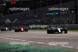 Valtteri Bottas (FIN) Mercedes AMG F1 W09 leads Kimi Raikkonen (FIN) Ferrari SF71H and Lewis Hamilton (GBR) Mercedes AMG F1 W09. 02.09.2018. Formula 1 World Championship, Rd 14, Italian Grand Prix, Monza, Italy, Race Day.